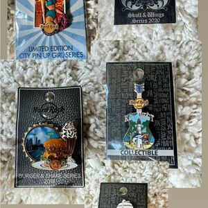 Collection set of Hard Rock Cafe limited edition collectible pins series.